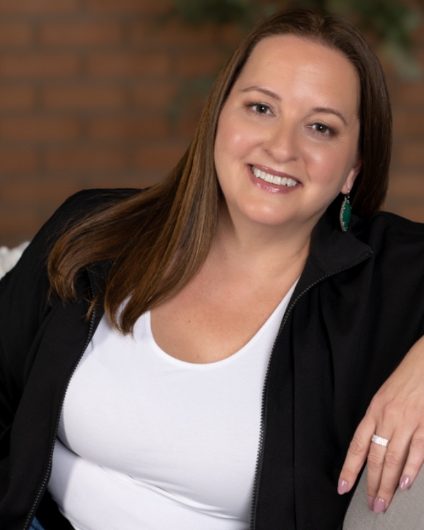 Headshot of Katee Van Horn, Chief People Officer at ChargeNet Stations.